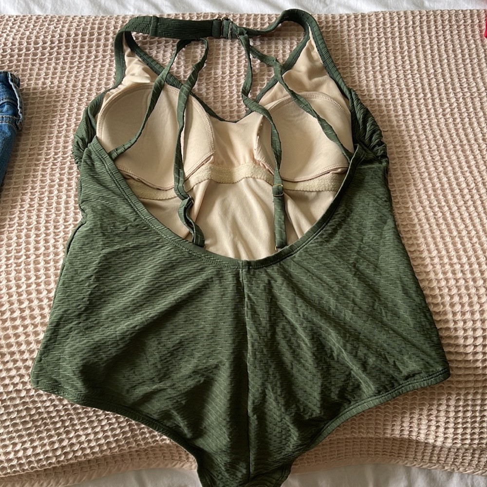 Beautiful green one piece with back detail